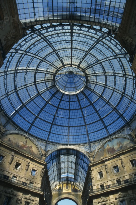 ITALY, Lombardy, Milan, Galleria Vittorio Emanuele II shopping arcade designed by the architect Giuseppe Mengoni in 1865.  Detail of glass ceiling and dome.