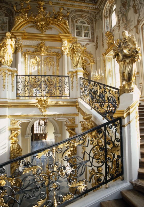 RUSSIA, St Petersburg, Peterhof, "Great Palace.  Interior, detail of the main staircase and ornate  gold and white baroque decorative style."