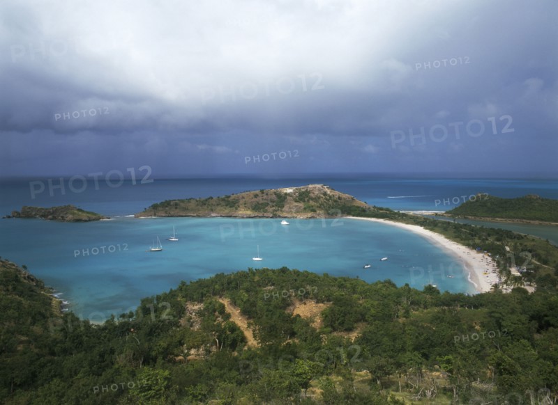 WEST INDIES, Antigua, Five Islands, "Deep Bay.  View from above over bay with moored boats, and surrounding coastline."