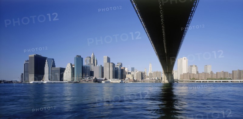 USA, New York State, New York, Lower Manhattan.  Post September 11 skyline from Brooklyn with underside of bridge in the foreground.