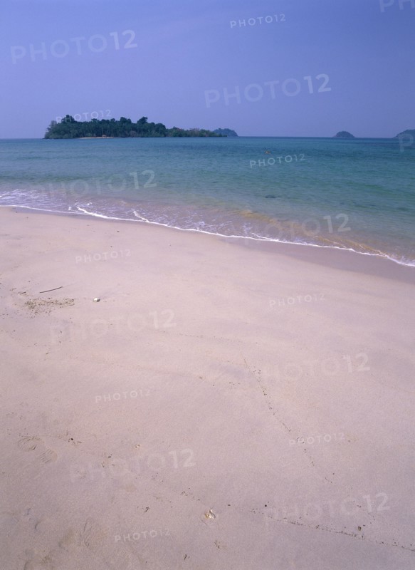 THAILAND, Trat Province, Koh Chang, "Lonley Beach, Aow Bai Lan. View out toward small island from sandy shore."