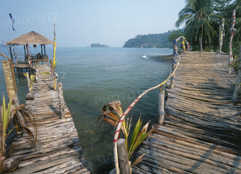 THAILAND, Trat Province, Koh Chang, "Lonley Beach, Aow Bai Lan. Bridge leading to a wooden platform built over the sea."