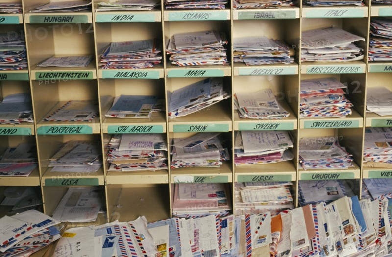 AUSTRALIA, New South Wales, Sydney, Dead letter office at Australia Post with airmail post sorted by country.