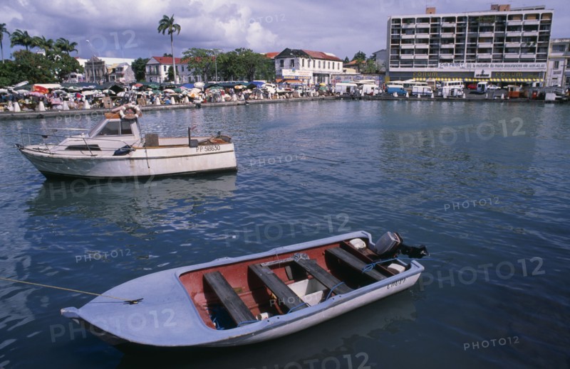 WEST INDIES, French Antilies, Guadeloupe, "Grande Terre, Pointe-a-Pitre.  Moored boats with busy quay and town buildings behind."