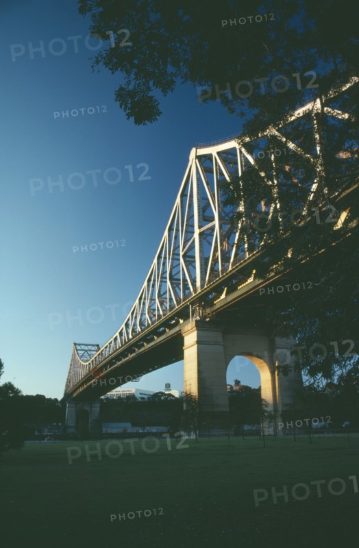 AUSTRALIA, Queensland, Brisbane, Angled view of Storey Bridge at sunset.