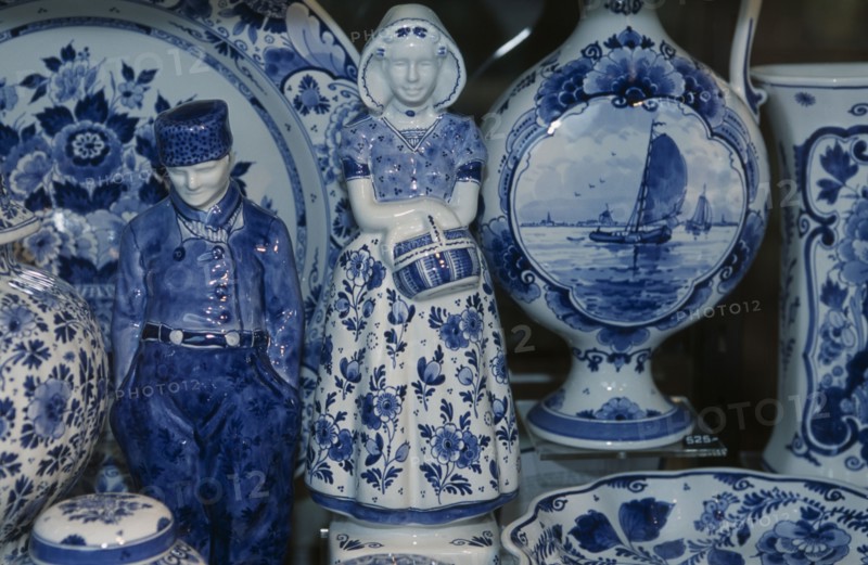 HOLLAND, Zuid Holland, Delft, Close up view of a display of delftware in a shop called De Porceleyne Fles.