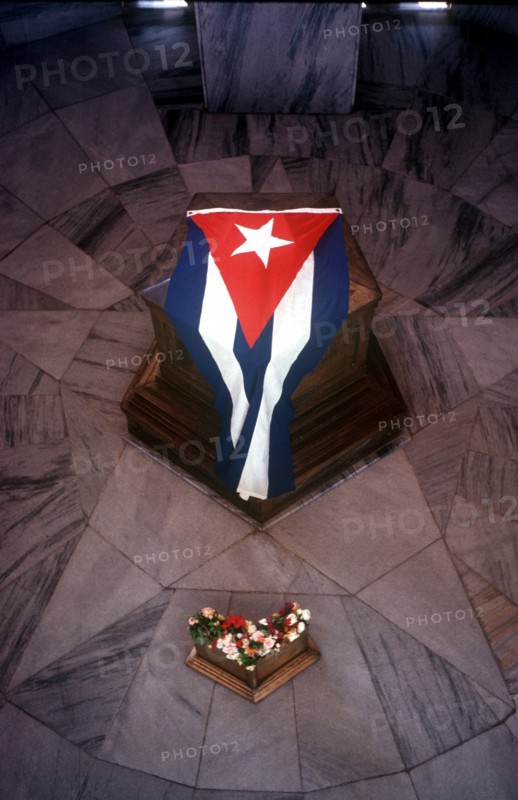 CUBA, Santiago de Cuba, Santiago, The tomb of Jose marti with the Cuban flag draped over it