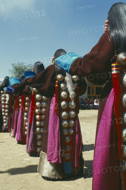 CHINA, Quinghai, Tibetan ladies dancing at a religious festival