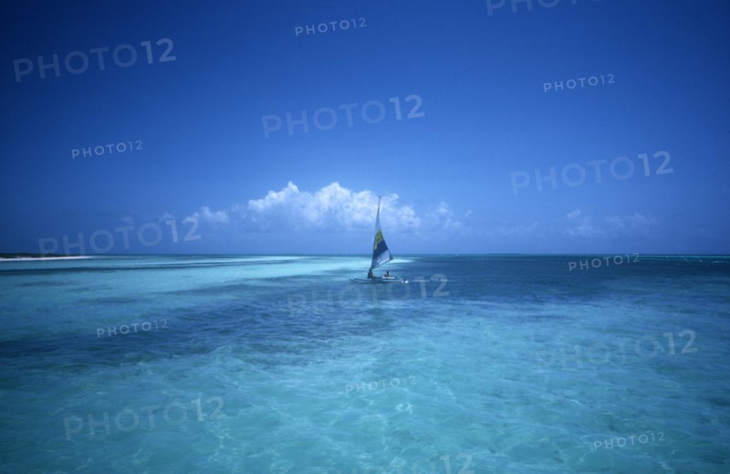 CUBA, Ciego de Avila, Cayo Guillermo, Small catamaran boat in shallow waters
