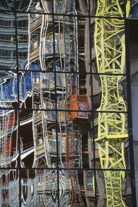 ARCHITECTURE, Detail, Mirror panels of building reflecting scaffold tower and surrounding architecture