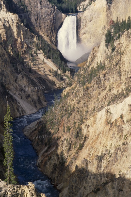 USA, Wyoming, Yellowstone National Park, Grand Canyon of  Yellowstone with waterfall cascading into river below