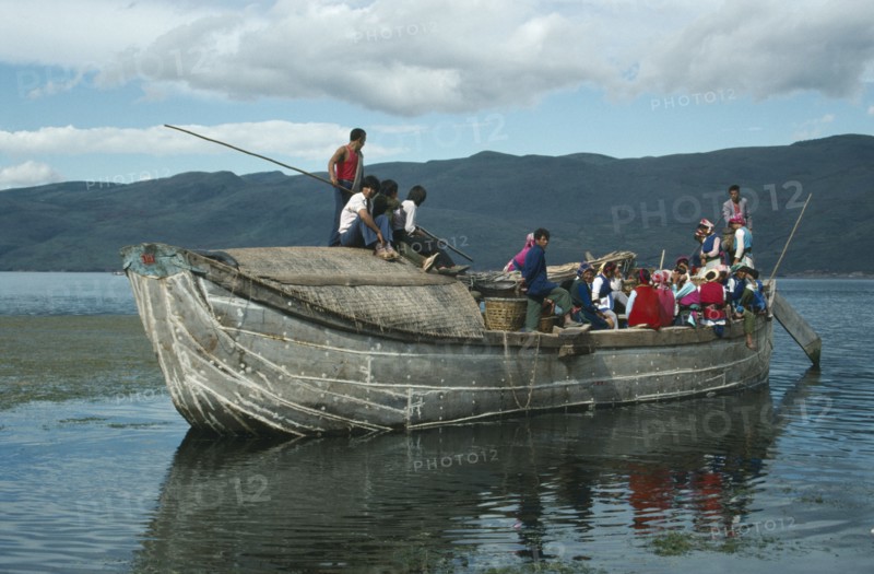 CHINA, Yunnan, Dali, Old junk carrying people on lake Er also known as Er Hai