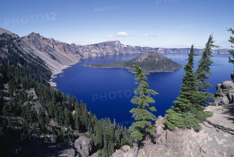 USA, Oregon, Crater Lake National Park, View over water filled crater formed after the erruption of Mount Mazama with small island in the middle