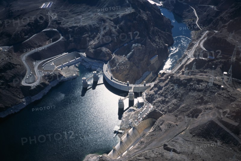 USA, Nevada, Hoover Dam, Aerial view from helicopter showing difference in water levels and overflow channels either side of the dam
