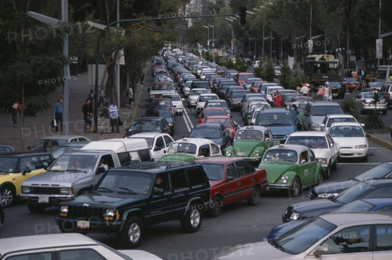 MEXICO, Mexico City, "Traffic congestion on Paseo de La Reforma, long tailback of cars and taxis."