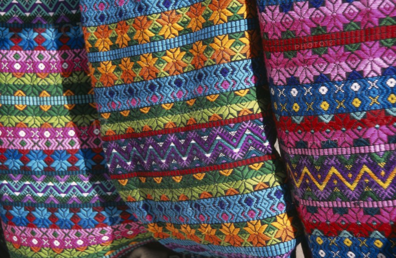 MEXICO, Chiapas, San Cristobal de Las Caras, "Close view of contrasting, multi coloured pattern textiles."