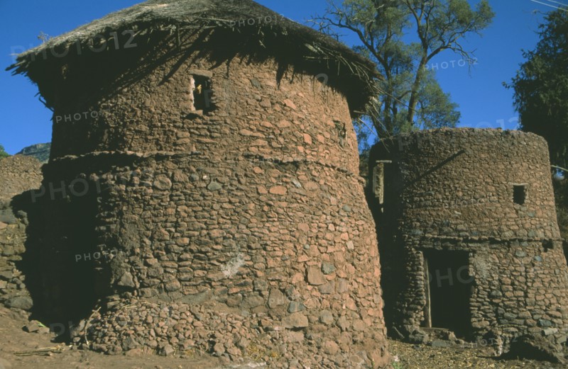 ETHIOPIA, Lalibela, "Original thatched mud brick round houses, now part of Unesco World Heritage Site."