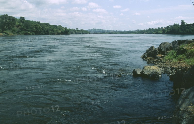 UGANDA, Jinga River, View down river bridge in distance Source of the Nile