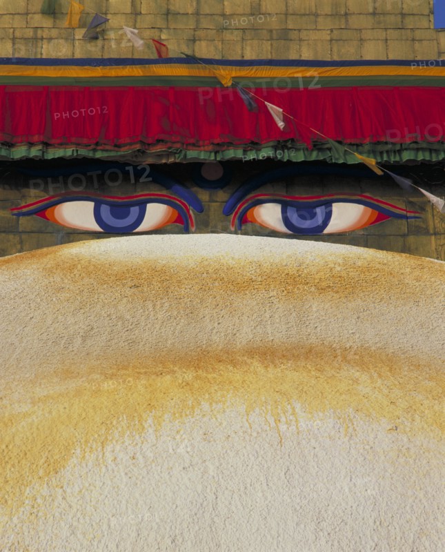 NEPAL, Kathmandu, Bodnath Temple detail of roof and eyes