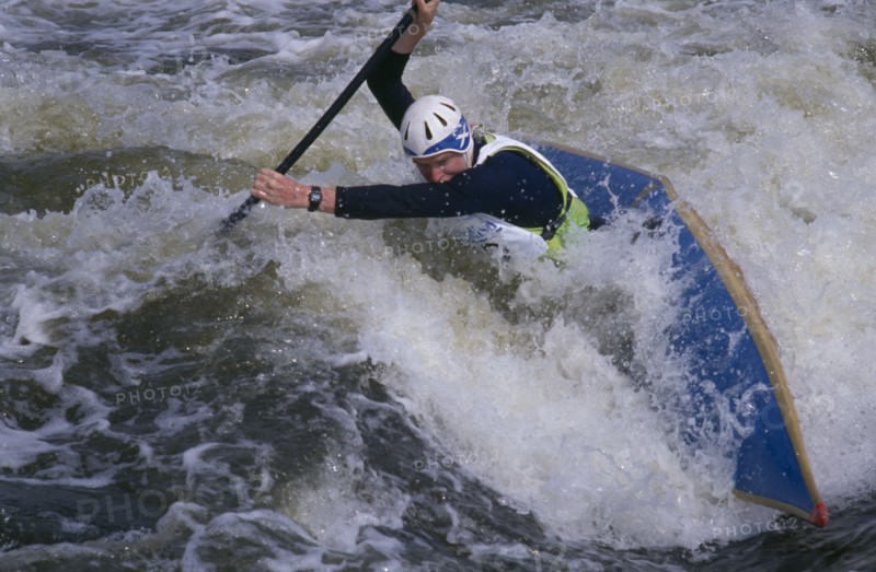 10001994 SPORT Watersport Canoe  Canoeist in Slalom rapids in Holm Pierre Point in Nottingham  England