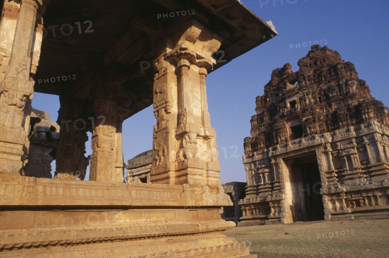 INDIA, Karnataka, Hampi, Ruins of Vijayanagar ancient capital.  Partial view of the exterior of Achyutaraya Temple