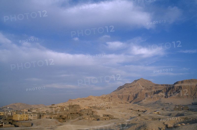 EGYPT, Upper Egypt, Old Qurna, General view of the village with the Tombs Of The Nobles on the hills behind