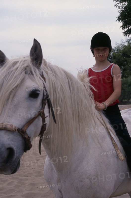 20002708 SPORT Equestrian Horse Riding Young girl on pony