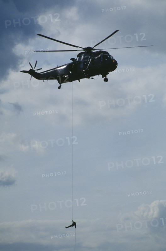 TRANSPORT, Air, Helicopter, Soldier absailing from Sea King helicopter