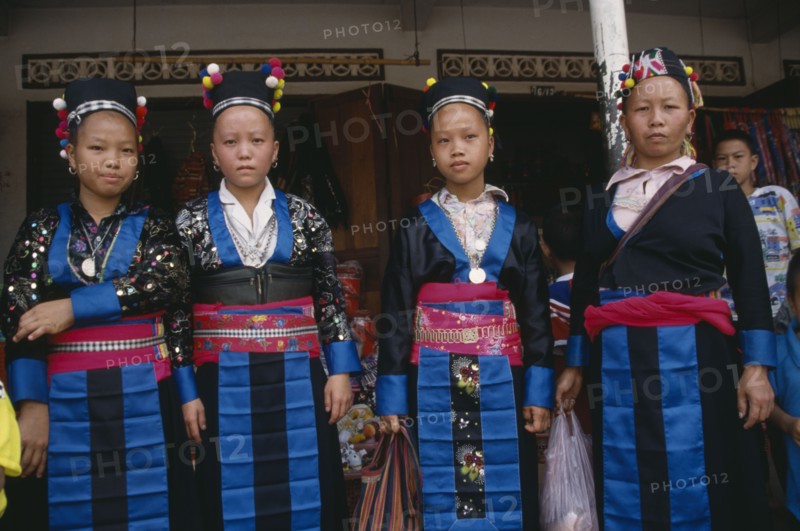 LAOS, Luang Prabang, Four Hmong women in traditional dress