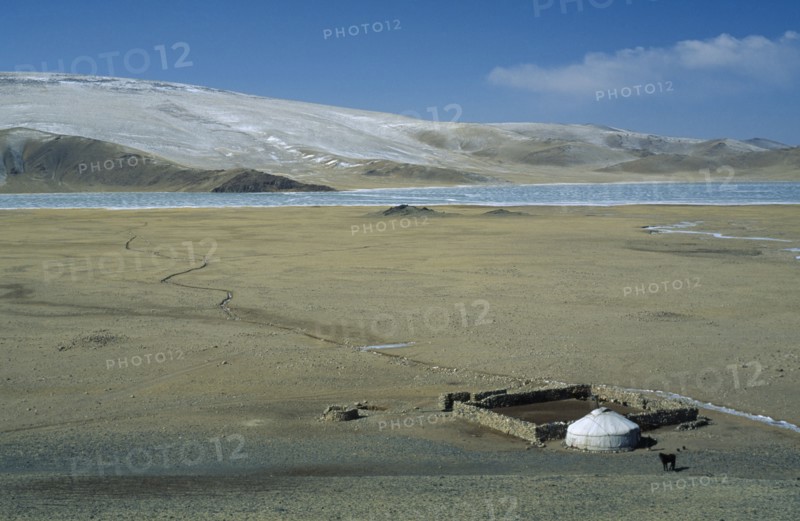 MONGOLIA, Bayan Olgii Province, View over Kazakh nomad camp with single yurt and surrounding landscape