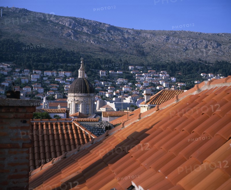 CROATIA, Dalmatia, Dubrovnik, Renovated tile roofs and Cathedral dome dating from 1667