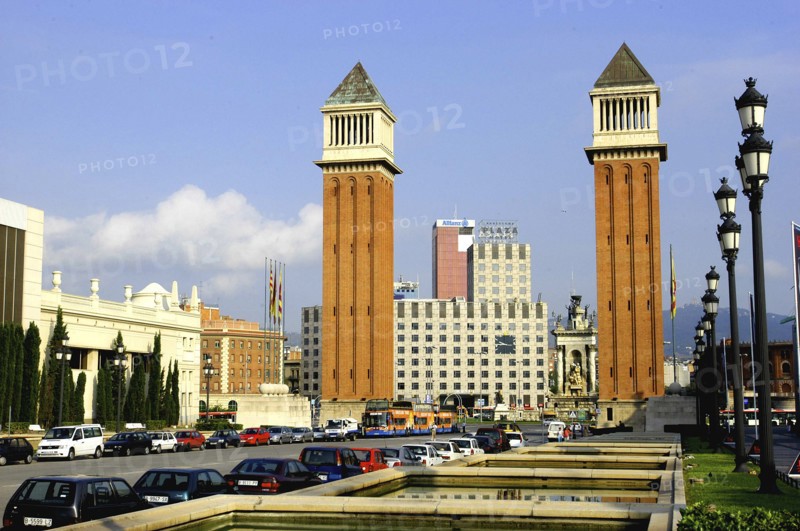 SPAIN, Catalonia, Barcelona, Placa d Espanya. View of the two 154ft high brick campaniles by Ramon Raventos.