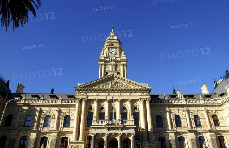 SOUTH AFRICA, Western Cape, Cape Town, Angled view looking up at the neo classical City Hall facade and clock tower