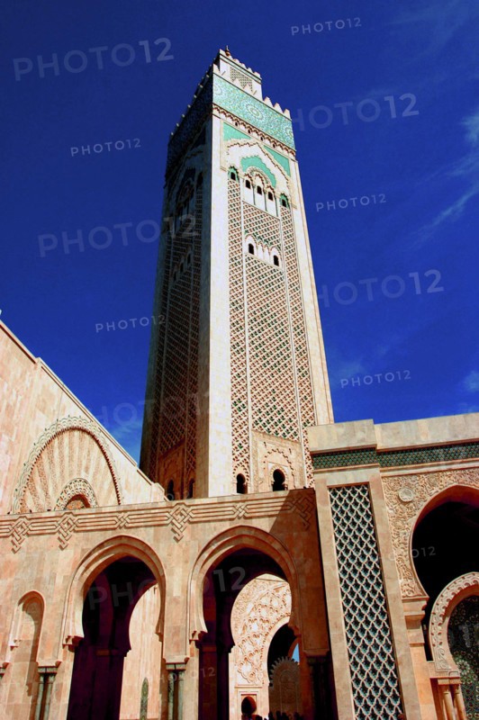 MOROCCO, Casablanca, Angled view looking up at the tower of Hassan II Mosque