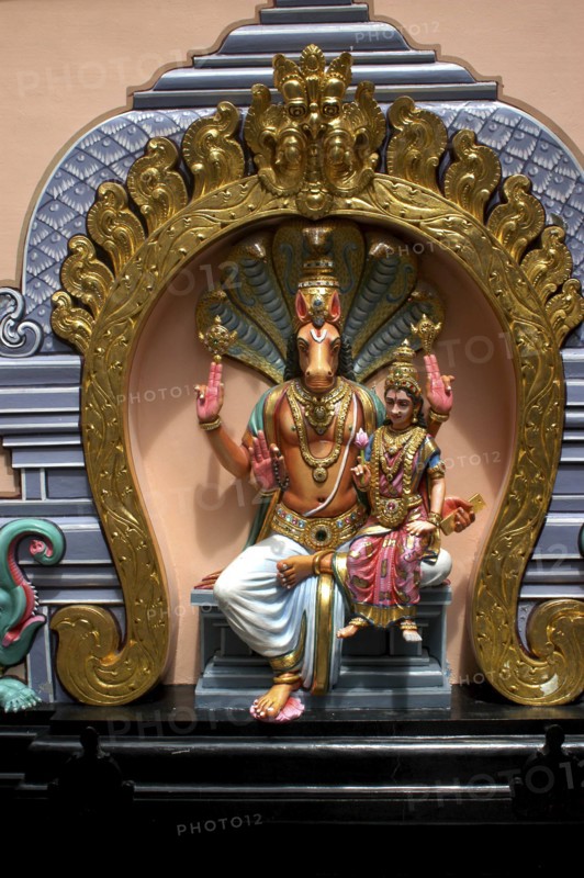 SINGAPORE, Central, Chinatown, Sri Mariamman Temple. Detail of brightly coloured Hindu carvings dating from 1862