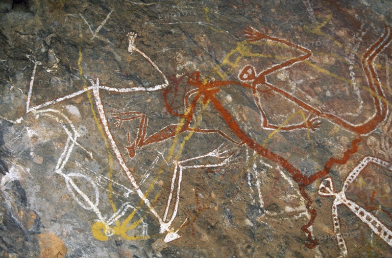 AUSTRALIA, Northern Territory, Kakadu National Park, Aboriginal rock painting depicting dancing figures at Nourlangie Rock