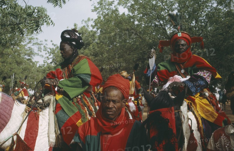 NIGERIA, North, Katsina, "Salah Day.  The Emirs entourage, mounted men in brightly coloured costume."
