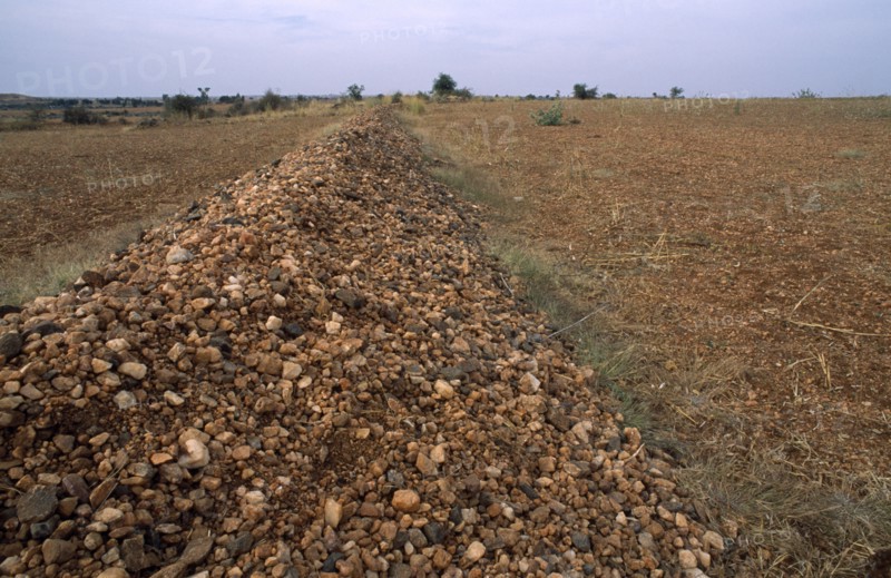 INDIA, Andhra Pradesh, Anantapur, Pebble bund made to catch rainwater runoff