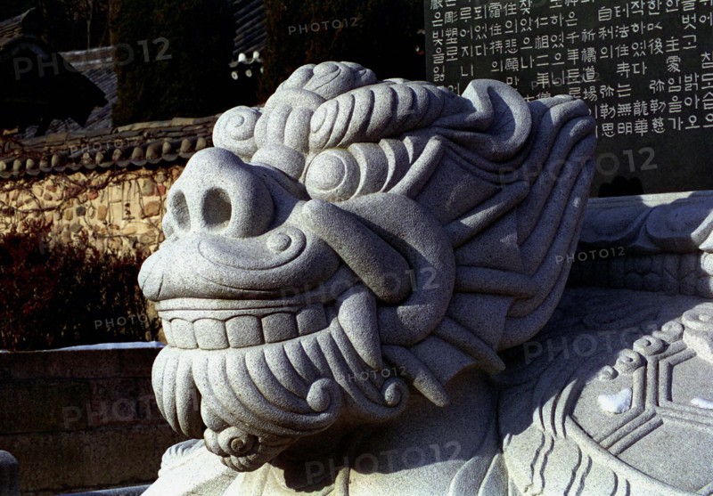 SOUTH KOREA, Songnisan National Park, Popchusa, Detail of dragon statue at the Temple