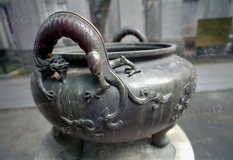 CHINA, Beijing, Forbidden City, Ancient Emperors cooking pot with handles in the form of dragons