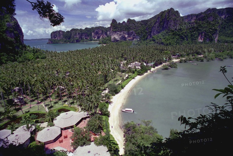THAILAND, Krabi, Aerial view over Rai Ley beach with palm covered land strip