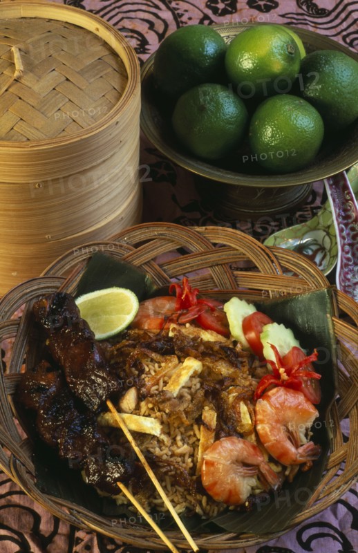 INDONESIA, Food, Nasi Goreng.  Traditional fried rice dish containing vegetables and meat or fish.