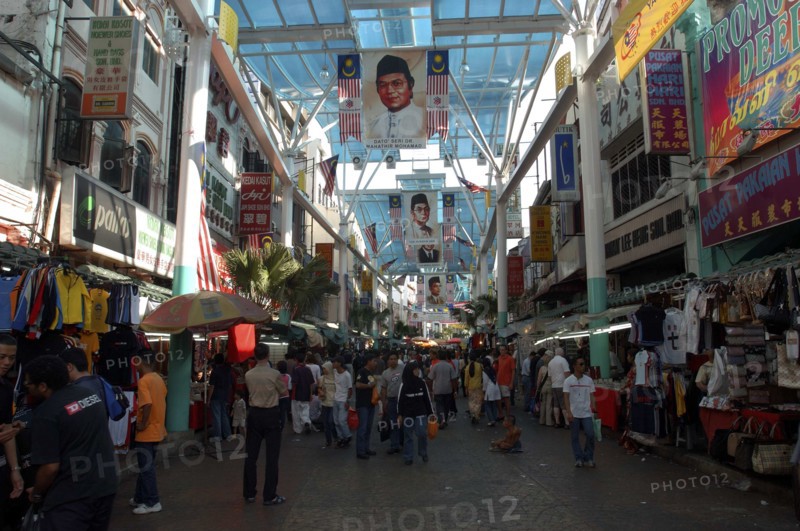 MALAYSIA, Kuala Lumpur, Chinatown, View along a covered market street lined with stallls