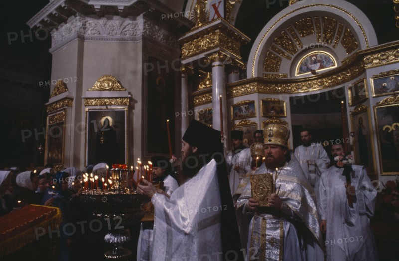 RUSSIA, Moscow`, St Daniil Monastery Orthodox priests in procession in front of the altar at Easter mass