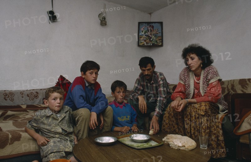 SERBIA, and MONTENEGRO, Kosovo, Poor Albanian family living on bread and cheese
