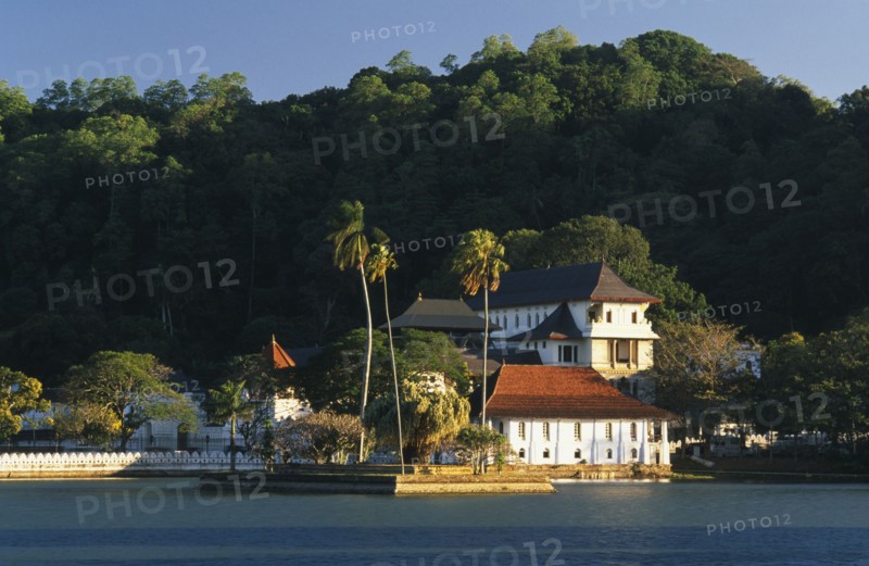 SRI LANKA, Kandy, Temple of the Tooth aka Dalada Maligawa. View over river toward the Buddhist Temple