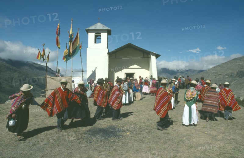 BOLIVIA, La Paz, Amarete, Nino Corrine.  Fiesta de la Cruz.  Countrywide festival held on May 3rd.  Musicians and dancers outside hilltop church.