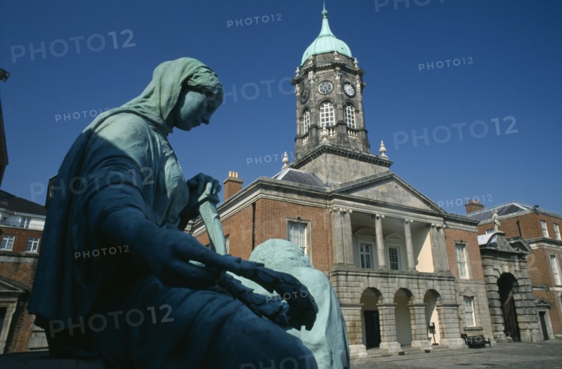 IRELAND, County Dublin, Dublin, Dublin Castle upper yard and side view of the Genealogical Office and Bedford Tower with statue in the foreground