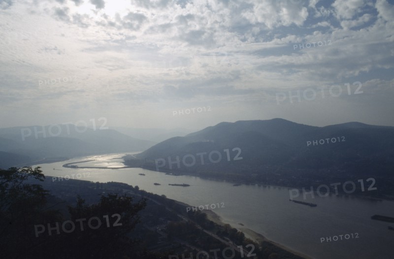 HUNGARY, River Danube, Bend in river and surrounding landscape in low light.