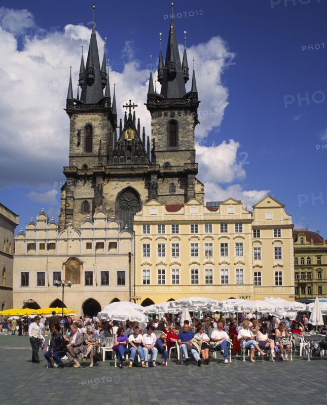 CZECH REPUBLIC, Stredocesky, Prague, Stare Mesto or Old Town Square. Crowds of people sitting at cafes overlooked by Tyn Church.